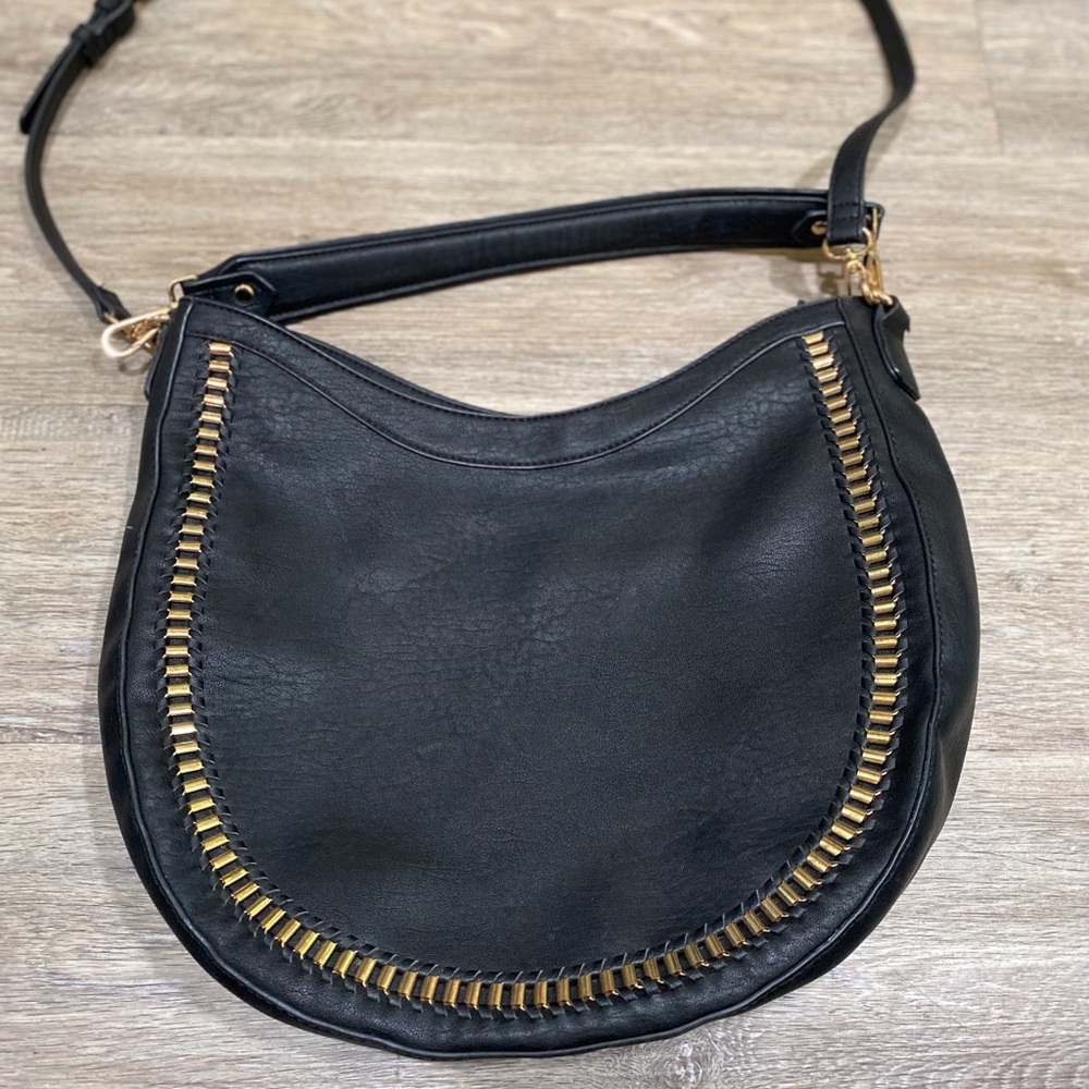 MMS design studio black vegan leather hobo bag with gold buckle hardware